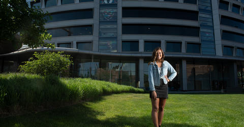 Hannah Bormann stands in front of University of Iowa Stead Family Children's Hospital, where she received cancer care as a teen and where she will work as a nurse starting in August 2020