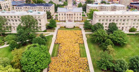 University of Iowa Class of 2026 forms a block I on the Pentacrest, near Old Capitol