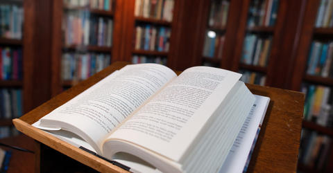 an open book at the Dey House, home to the Iowa Writers' Workshop on the University of Iowa campus