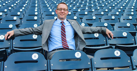 UI alumnus Joe Dwello sitting in seats at Washington Nationals ballpark