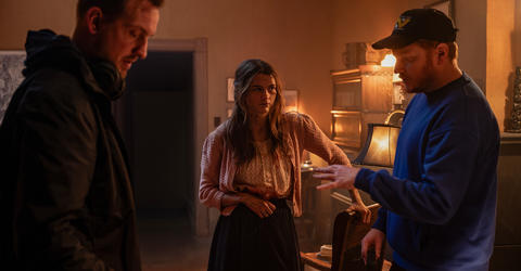 Scott Beck, Chloe East, and Bryan Woods on the set of Heretic