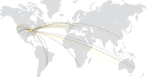 world map showing dashed lines from iowa city to points all over the world