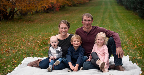 University of Iowa dental grad Amy Seehusen with her husband and their three children