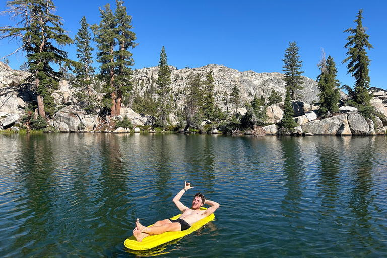 a man floating in a lake
