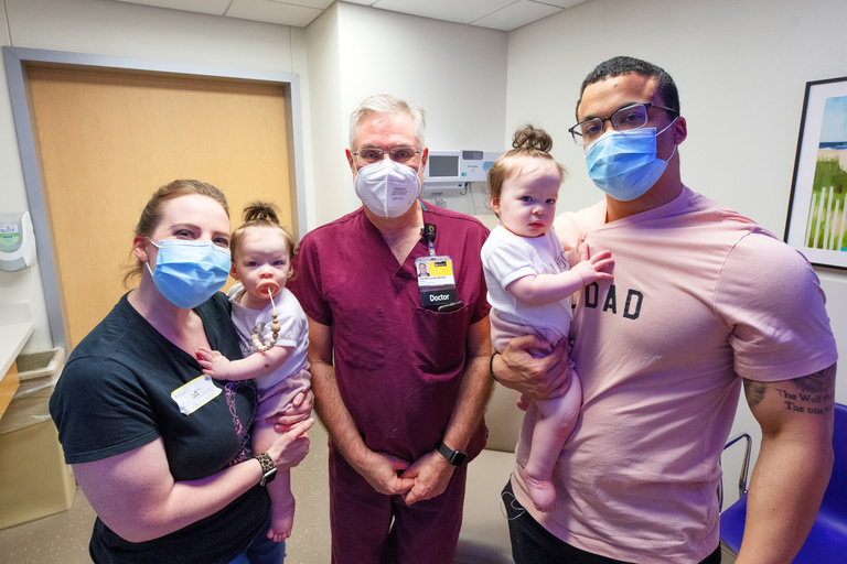 a doctor examines the McDaniel girls during an appointment