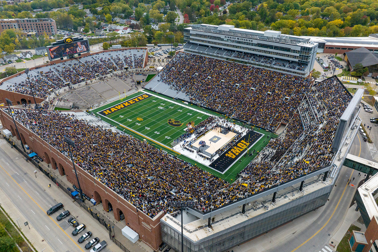 an aerial view of the basketball court on the turf at Kinnick Stadium