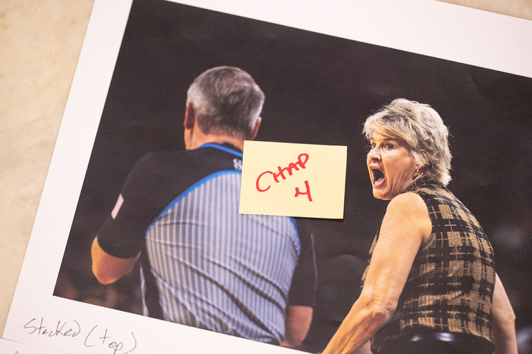 a photo of Iowa coach Lisa Bluder sharing her feelings with an official