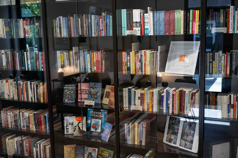 four bookshelves filled
