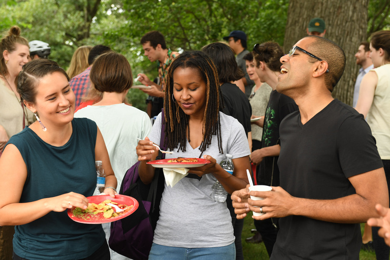 A group of people eating together