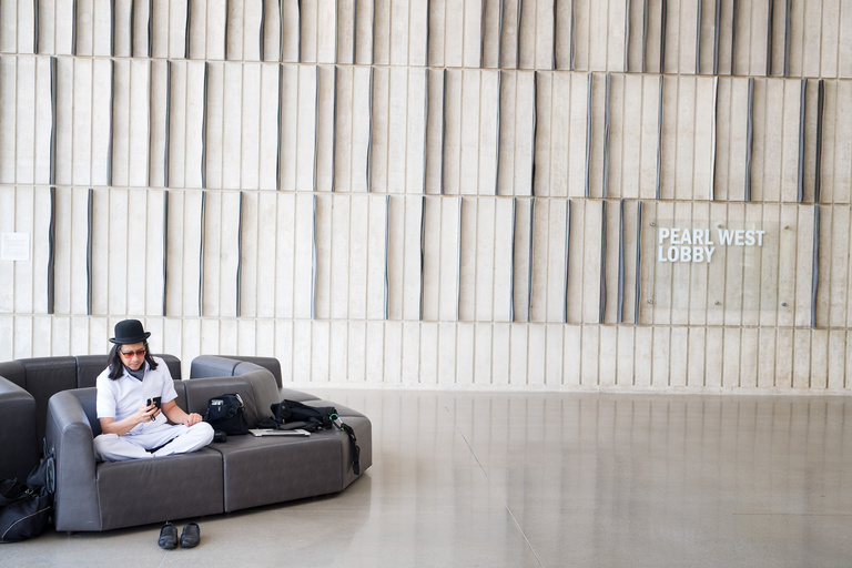 A man reading sitting in a chair