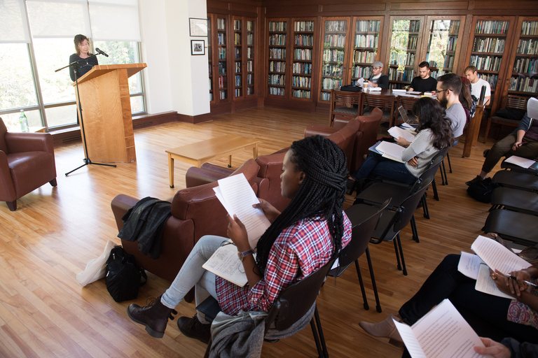 A woman speaking to an audience