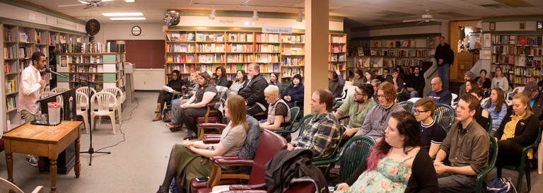 A man talking to a group of people