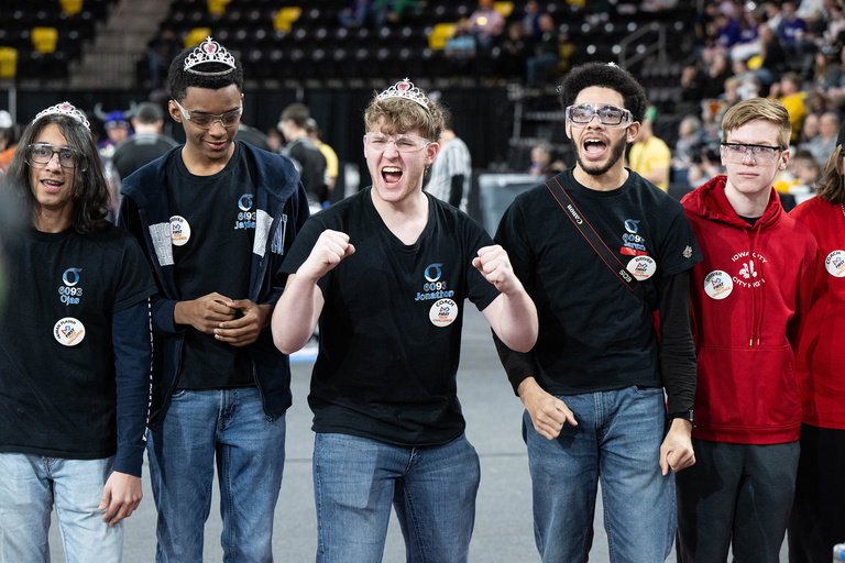 A team cheering together