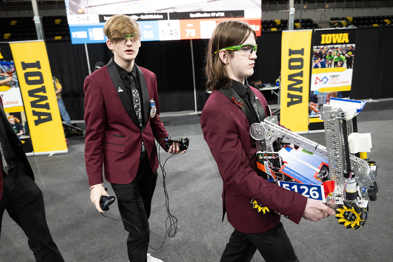 Two members of a team on their way to compete