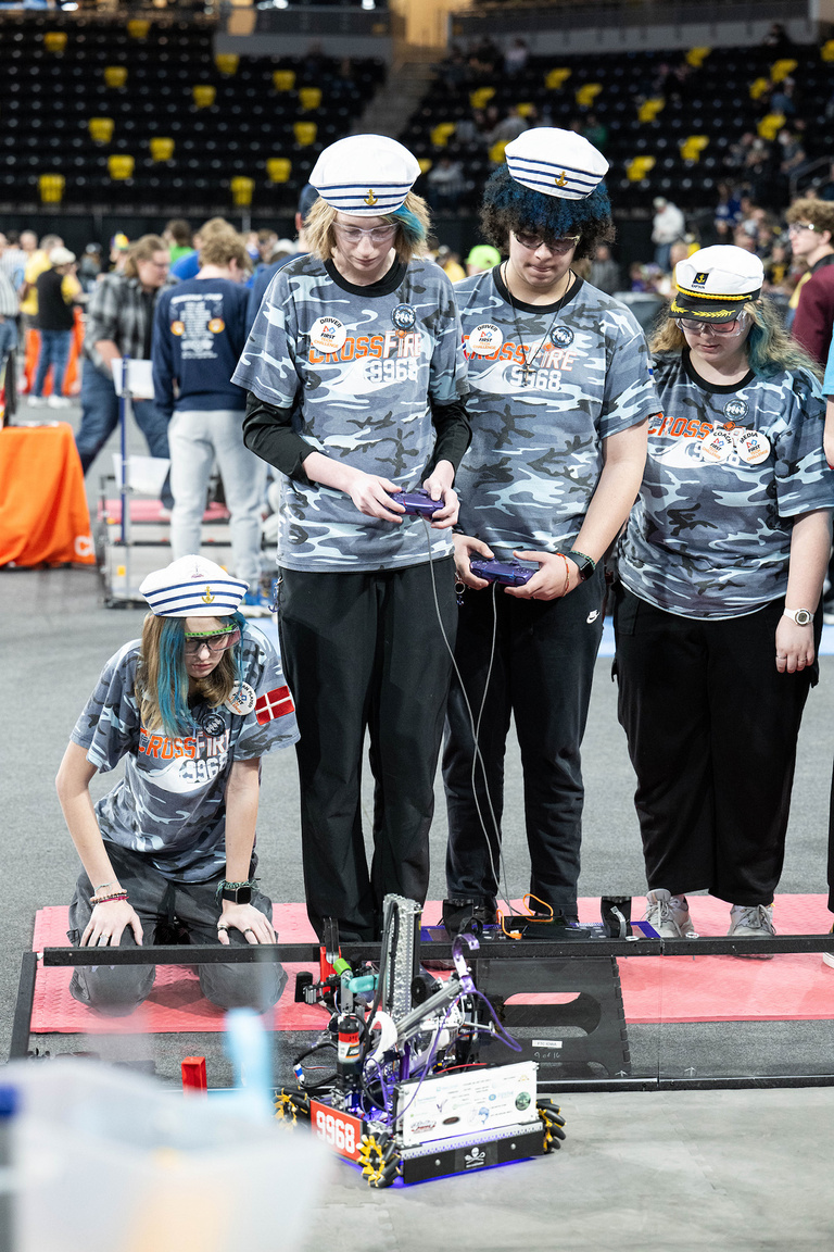 A team watching their robot