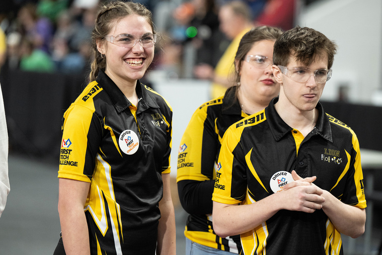 a group of people smiling