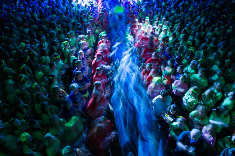 A line made in a crowd by people moving through it