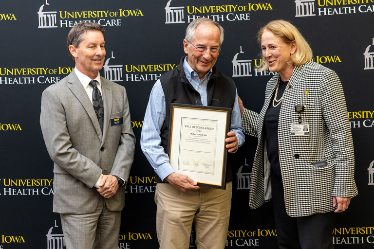 a man receiving an award