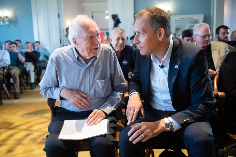 Two men sitting together