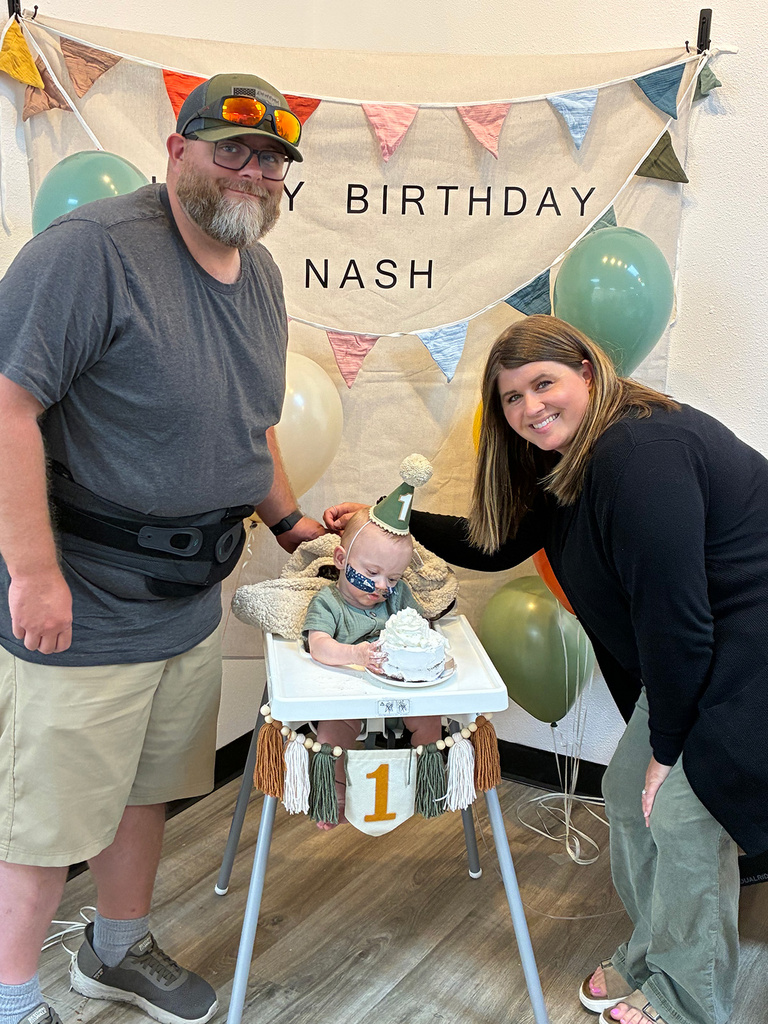 Nash Keen with his parents at his first birthday party
