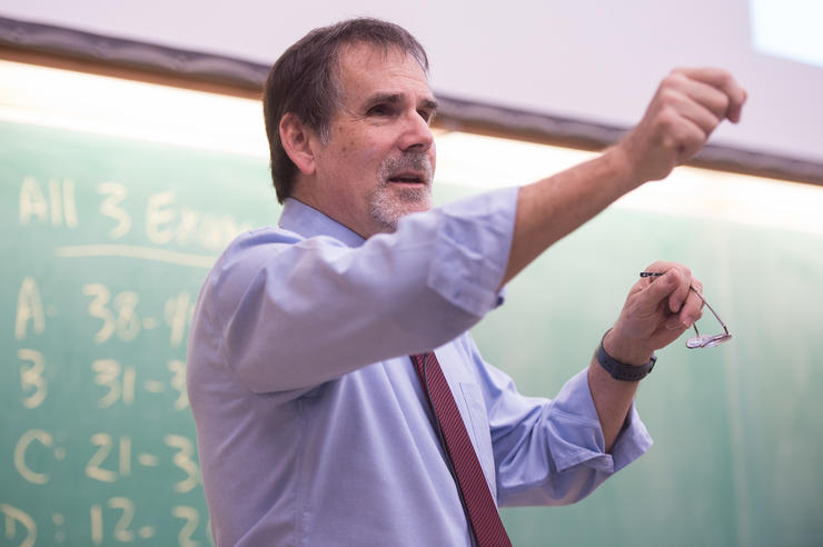 university of iowa physics and astronomy faculty member Craig Kletzing at the front of a classroom