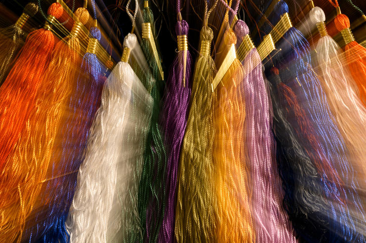 Multiple colored tassels in a row