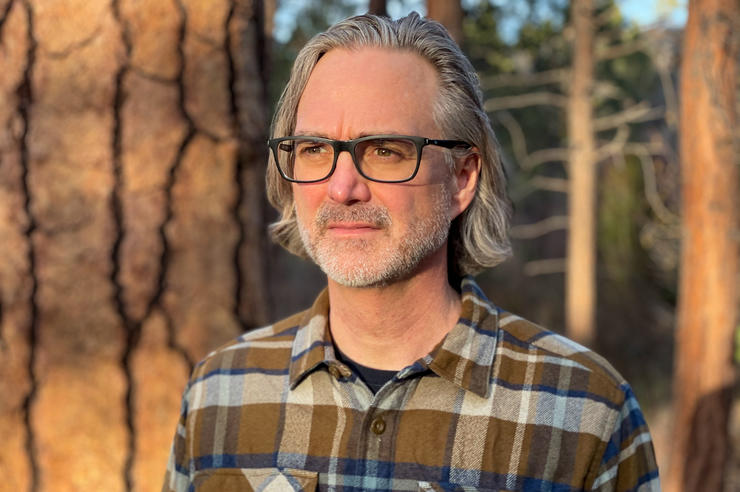 University of Iowa alumnus and film producer Michael Scheuerman outdoors in Oregon