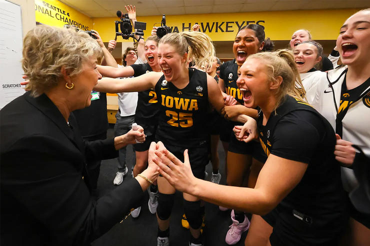Iowa women's basketball team celebrates in locker room