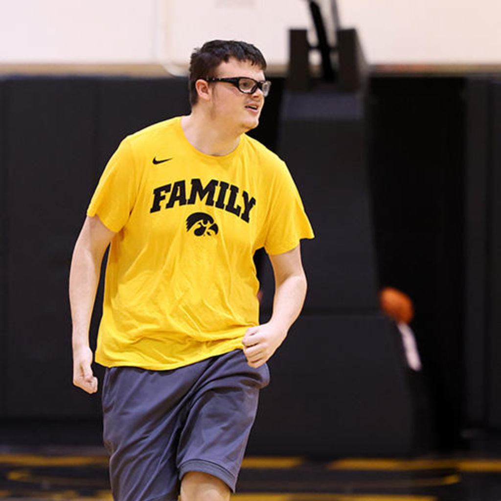 a young man at a basketball practice
