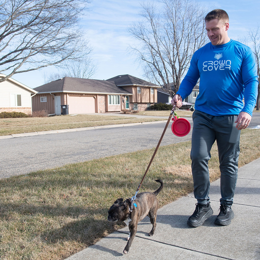 Jordan Hauck walking his dog