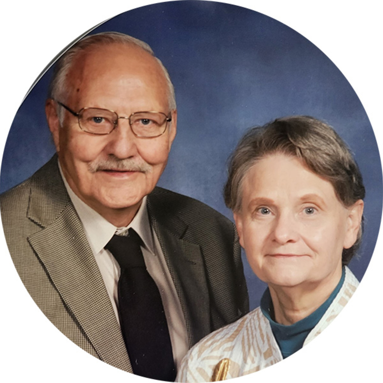 A couple smiling for a portrait