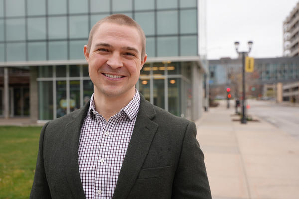 University of Iowa graduate Brian Damman standing outside in Des Moines