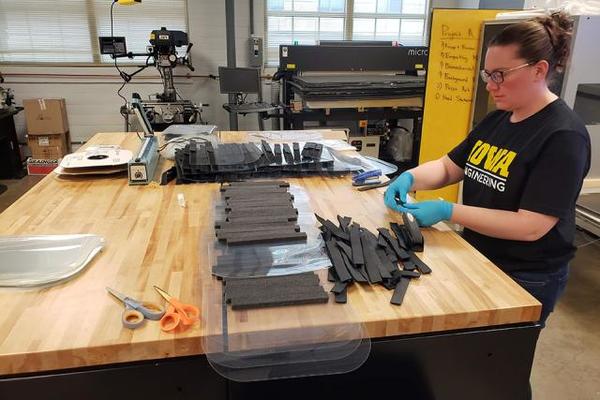 University of Iowa College of Engineering faculty member working on face shields