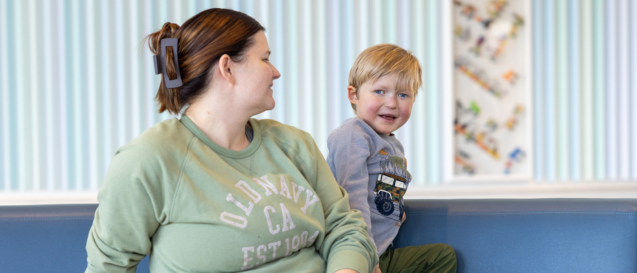 A child and his mother playing together