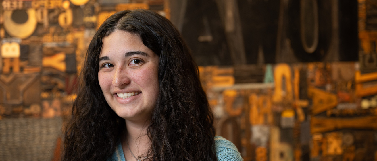 A woman smiling posing for a portrait