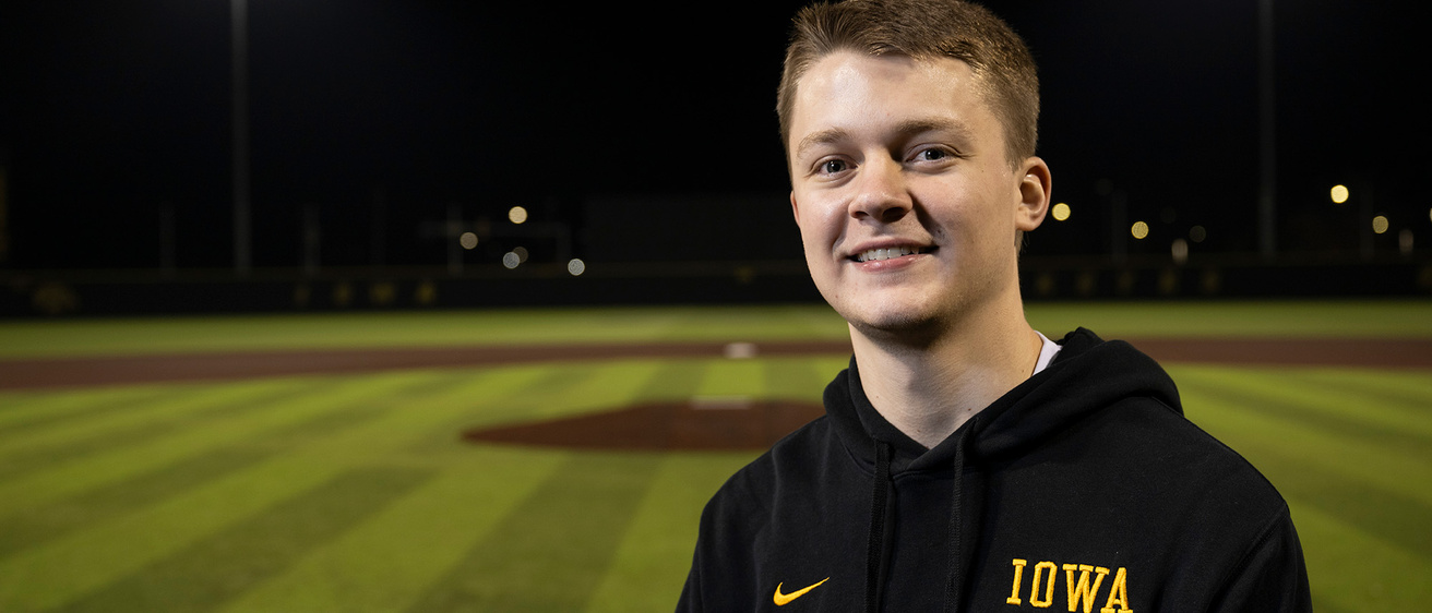 A man standing on a baseball diamond