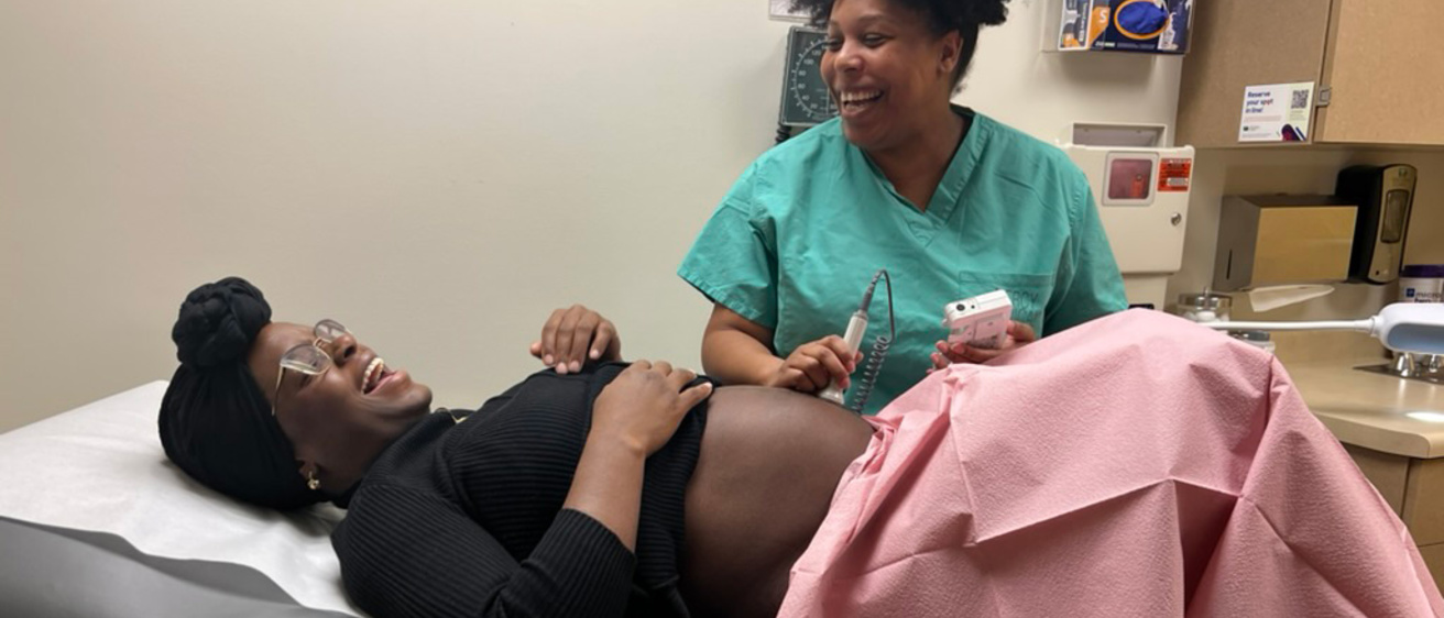 a doctor examining a pregnant patient