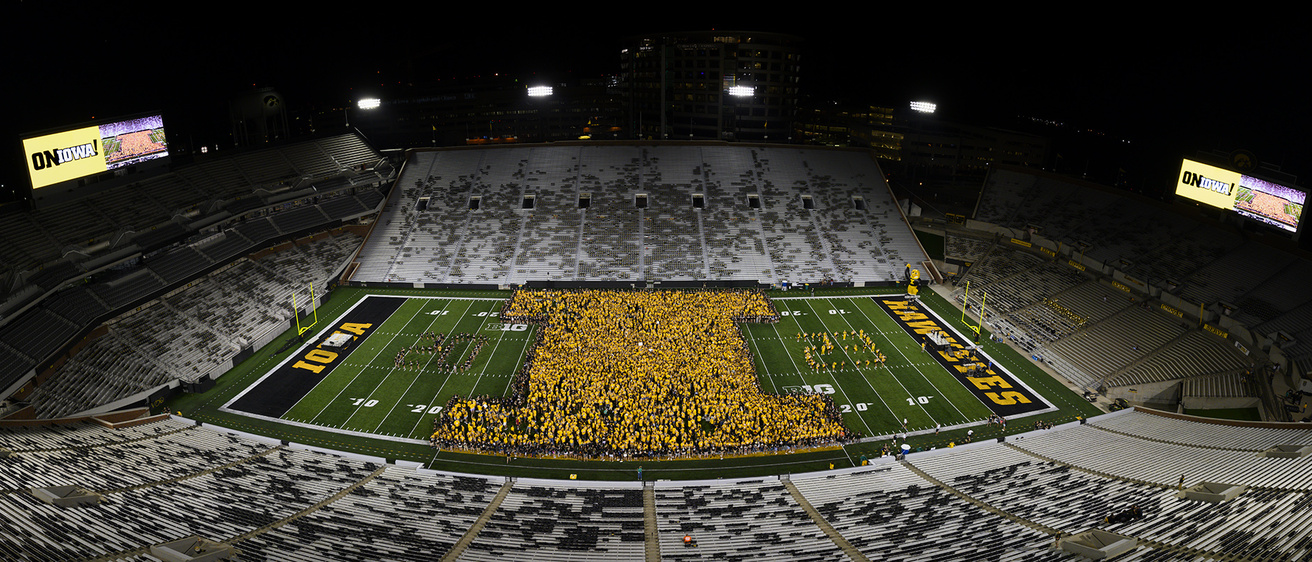 students at kinnick stadium forming the Block I