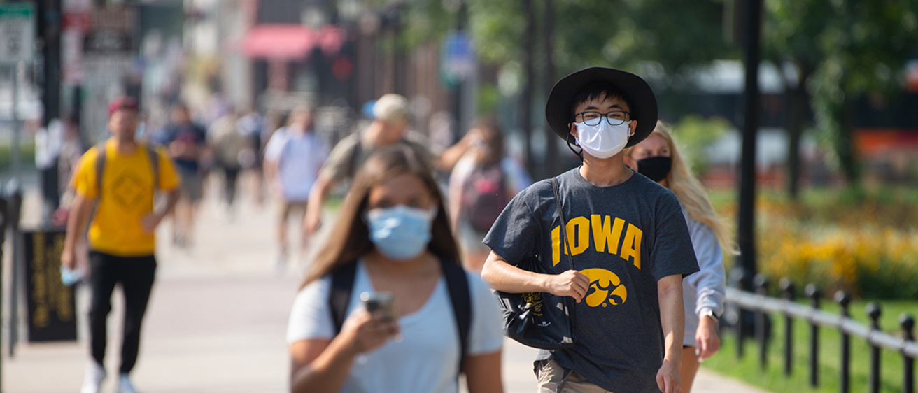students walking on campus on the first day of the fall 2020 semester