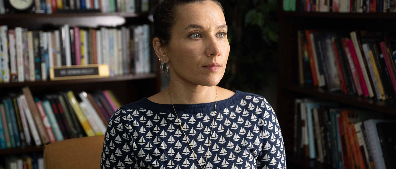 Melissa Febos sitting in a reading room