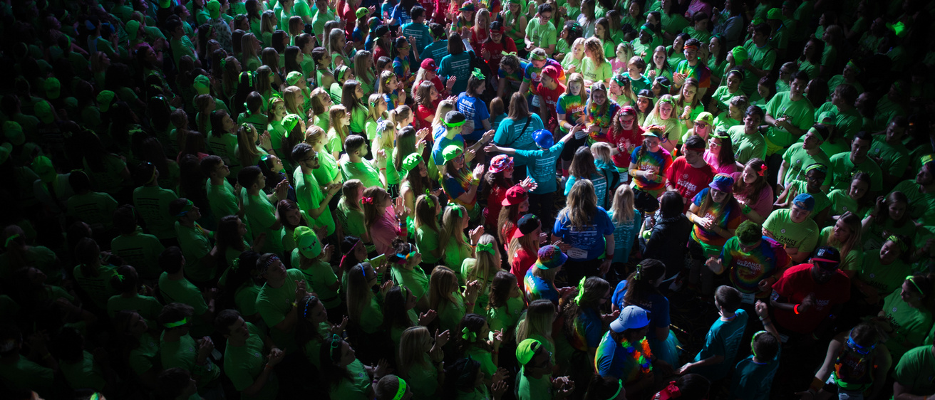 A crowd of people dancing