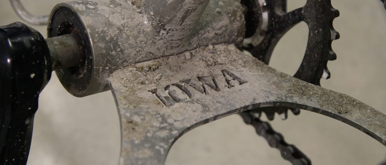 A partof a bike with Iowa engraved in it