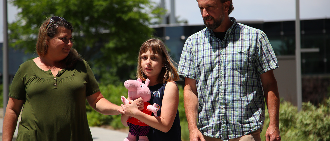 a family walking together outside