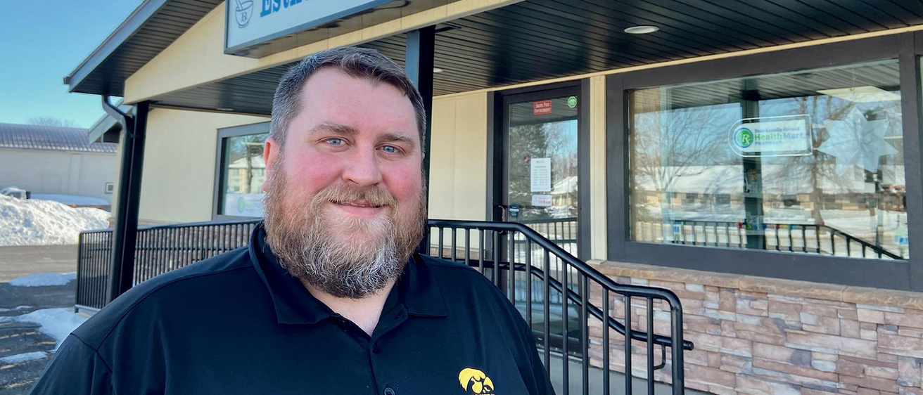 Andy Spurgin stands in front of his pharmacy
