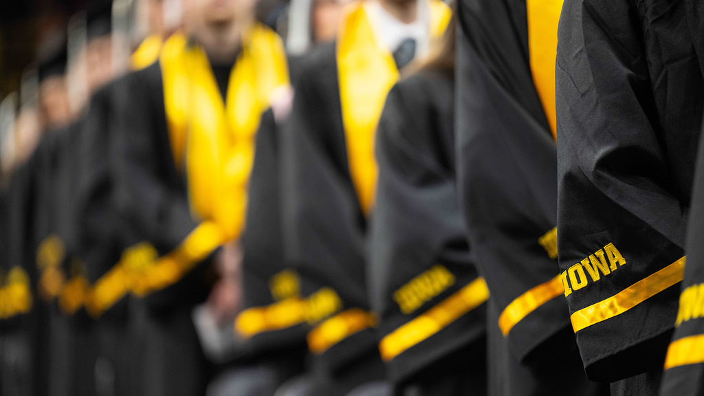 people in robes at a University of Iowa commencement ceremony