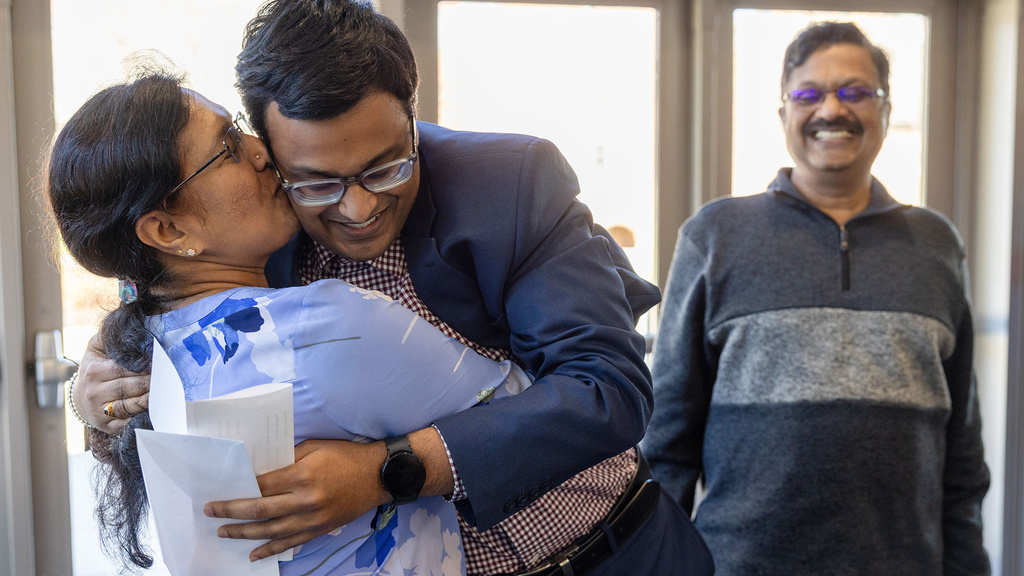 A man and woman embracing eachother