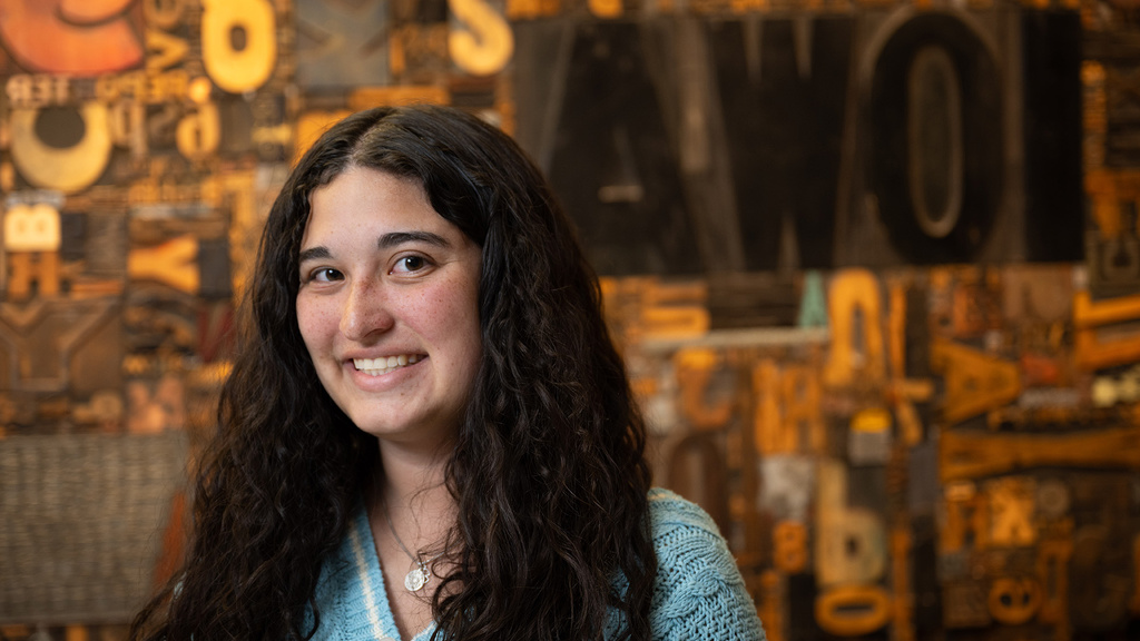 A woman smiling posing for a portrait
