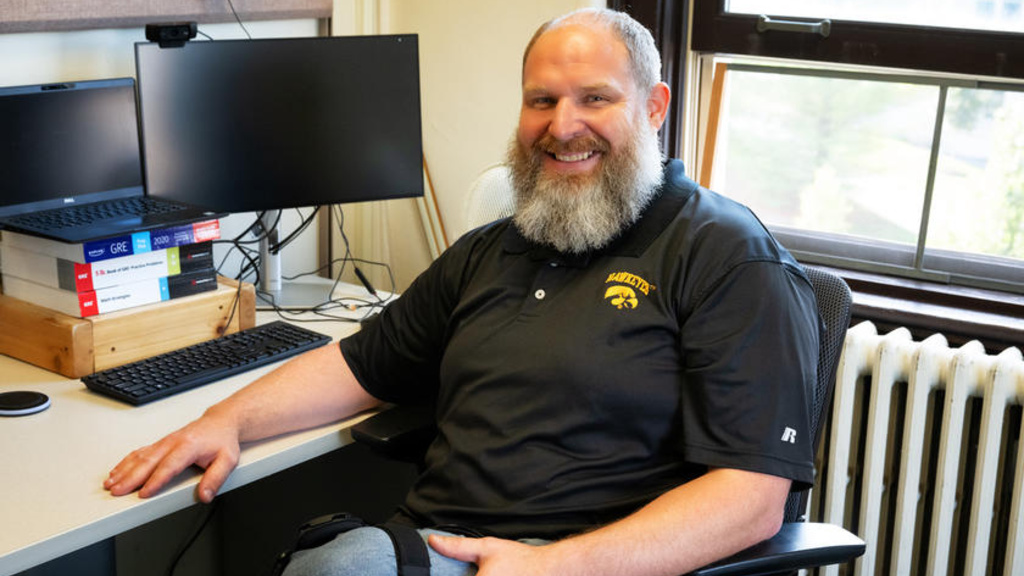 A man sitting at a desk