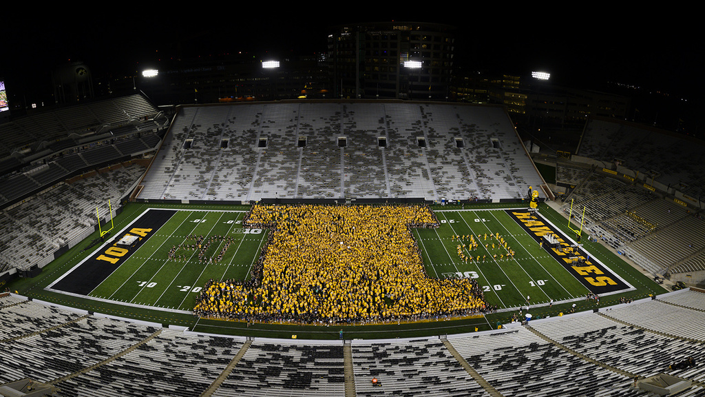 students at kinnick stadium forming the Block I