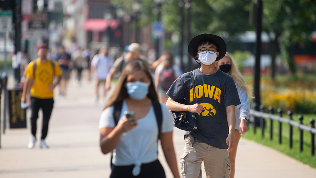 students walking on campus on the first day of the fall 2020 semester